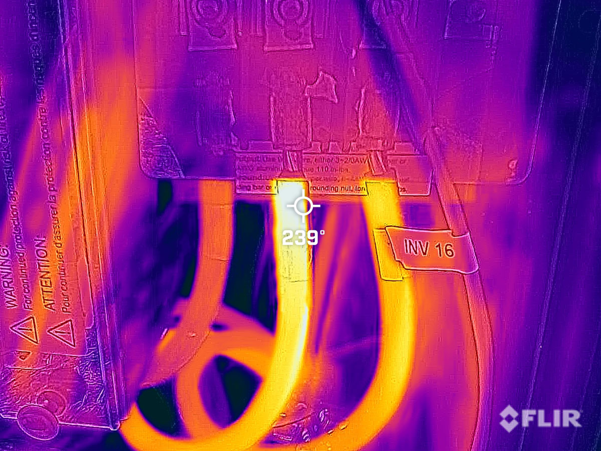 tsr-energy-thermal-electrical-connection-overheating Thermal image showing an overheated electrical connection reaching approximately 239°F inside solar equipment.